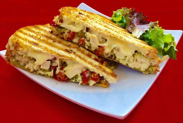 chicken panini with swiss cheese, grilled chicken breast , sun dried tomato & pesto sauce