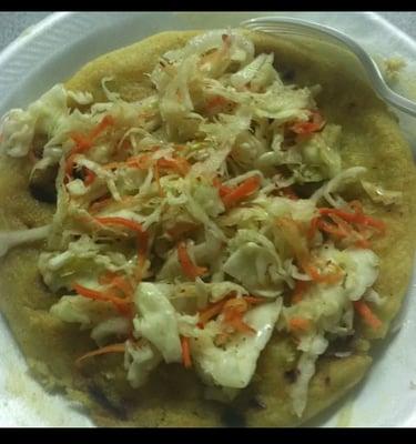 Cheese pupusa with curtido.