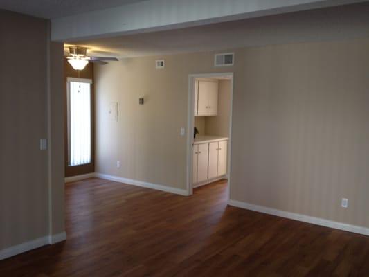 Two bedroom with wood-like flooring