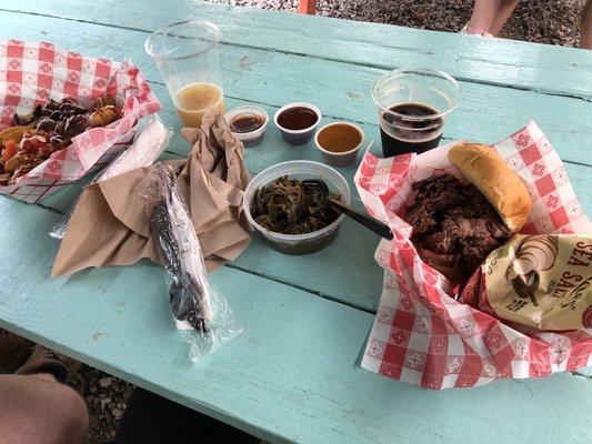 Brisket nachos, brisket sandwich, collard greens, IPA, Alley Bat stout