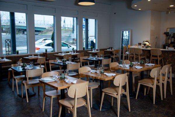 The Fullham and Carlo Mid Century Modern Natural Sidechairs with our Solid Butcherblock Wood Tops look great at our clients restaurant