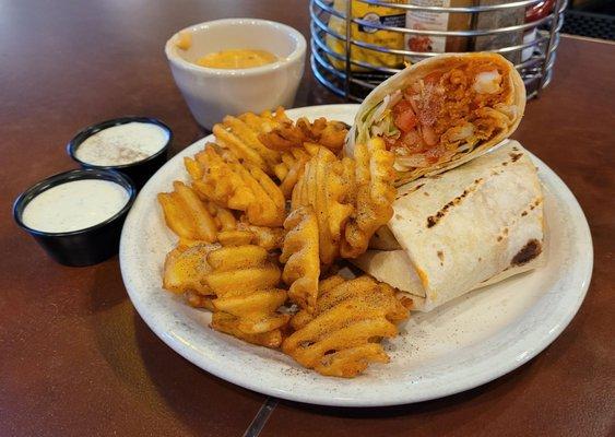 Buffalo chicken wrap rap with waffle fries,  a side of queso and extra ranch.