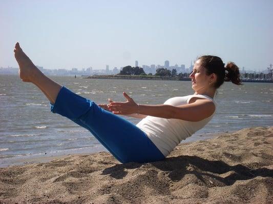 in Paripurna Navasana - Sailing like a boat near the Alameda Marina