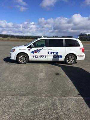 on the tarmac our wing is casting a shadow