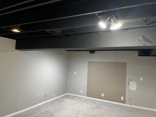 Industrial basement ceiling look