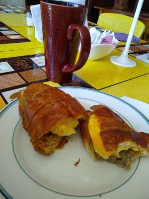 Breakfast sandwich and coffee.