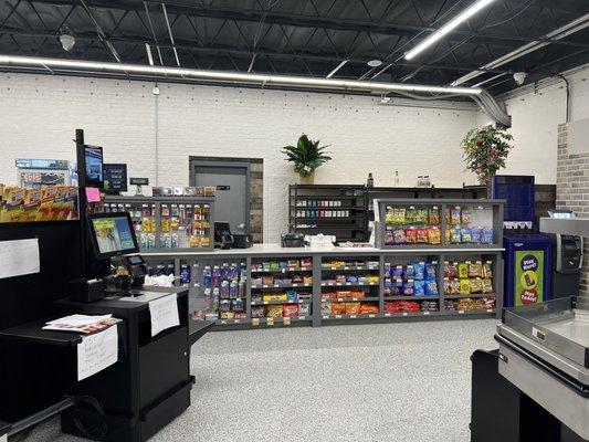 Customer service counter and self-checkout lane