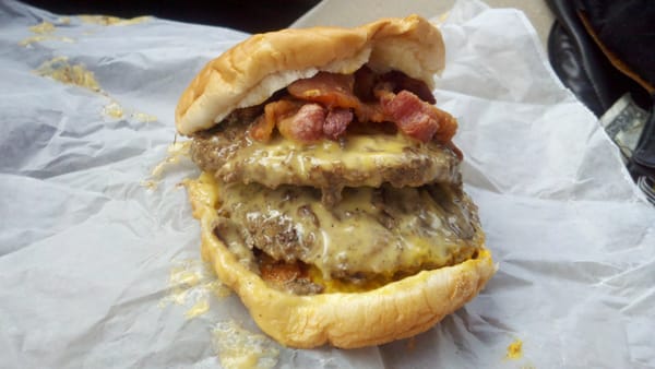 Bacon Double Cheeseburger with chili, onions and mustard