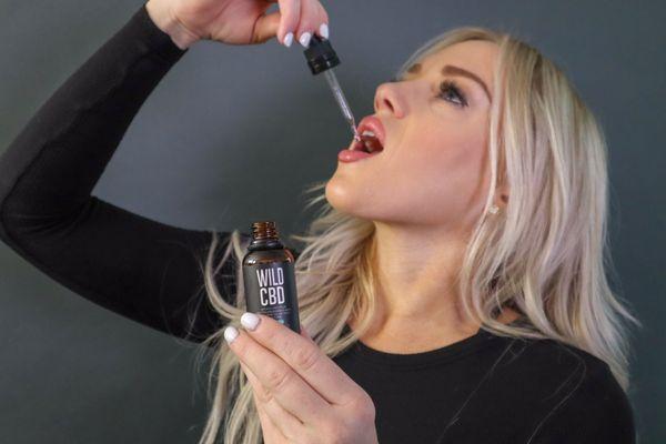 Jamie from our Wild Family enjoying her 500 mg mint flavored tincture