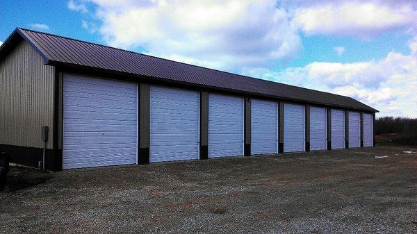 This is one of our maxi storage buildings. The units are 14ft wide by 42ft deep, include electricity, and have a 12ft x 12ft overhead door.