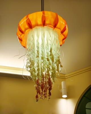 The bars Jellyfish chandelier icon  was designed and  handmade by local artists.