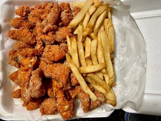 1 lb. Catfish Nuggets ( hidden under the paper is a Cole slaw and 2 slices of white bread)