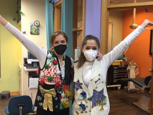 Dr. Maggie and Dr. Lorielle showing their holiday spirit on our yearly Ugly Vest/Sweater dress up day