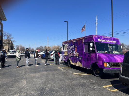 Wonkoos outside of Money Ball Sportswear on Southfield Rd