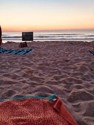 No mat needed! Just a beach towel for sunrise yoga.