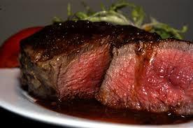 Try our Wednesday Steak night.  You get a 7 oz. filet with choice of two homemade sides and a glass of wine for only $19.95.