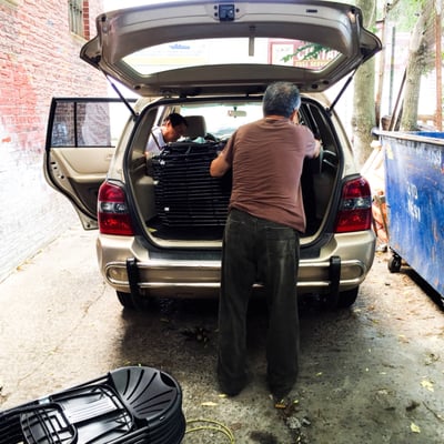 One of the employees loading up the 25 chairs I rented. Quick and easy transaction.