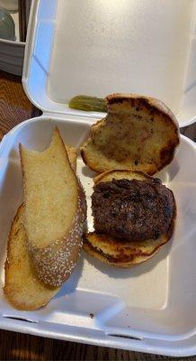 Steak sandwich and garlic bread