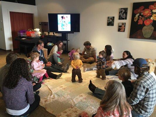 Children getting their parent's precious attention in Kindermusik class.