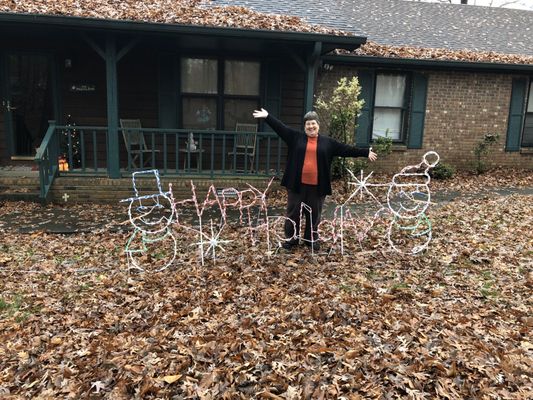 She loves her sign and how easy it is to put up!