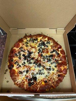 Large pepperoni salami and black olives with extra cheese