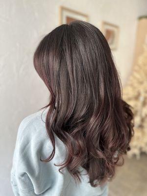 Violet toner and long layered haircut