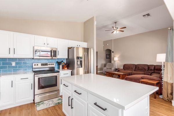 The after - backsplash and flooring came from Floor and Decor