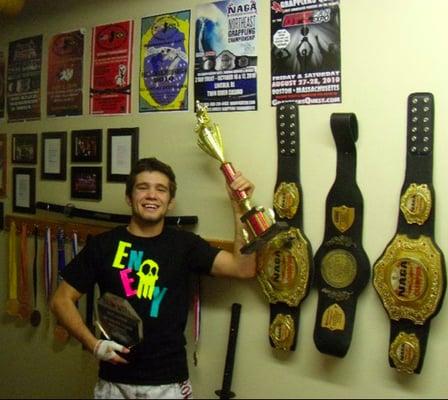 Coach Dan with some of his competition trophies