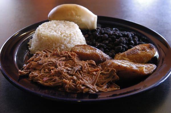 Pabellon / Ropa Vieja - Shredded beef or chopped chicken breast served with rice, beans, and sweet plantains