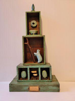 Bear shrine with handmade artifacts and vintage/antique boxes