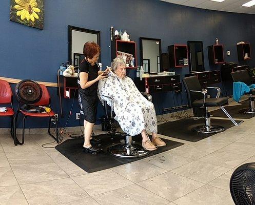 My mother getting a haircut.