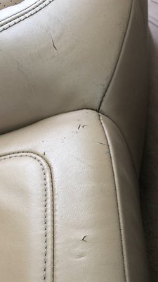 Cuts in leather seat.  They sent pictures from angle that hid the cuts.