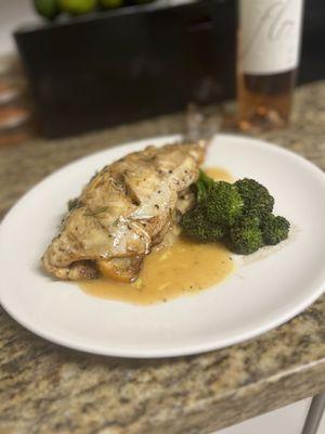 Pan roasted Branzino over mashedpotatoes with sautéed brocclini & a Rose Wine reduction