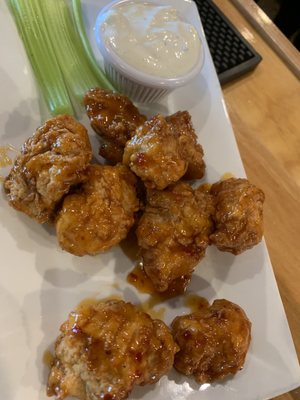 Sweet chili boneless wings with house made blue cheese dressing