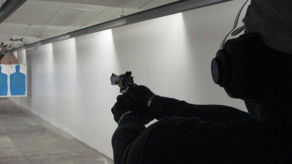 Armed Security students qualifying at R/D indoor range