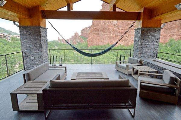 The view of Red Rocks doesn't hurt this beautiful outdoor space in Roxborough CO