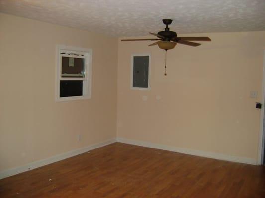 Windows, ceiling fans, trim, paint, vinyl floors