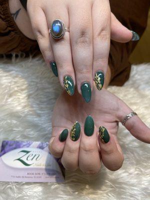 Green with gold flakes.