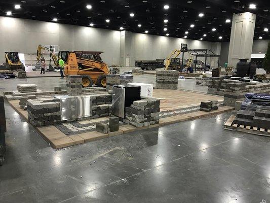 2018 Home Garden & Remodeling Show! Bench seating and outdoor kitchen install taking shape!