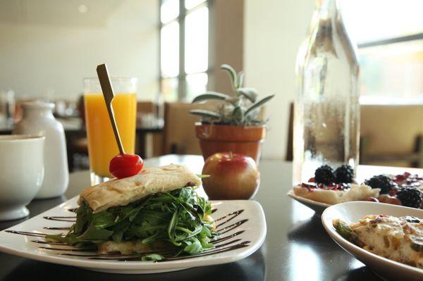 Egg whites and arugula with a balsamic glaze make a great breakfast sandwich!