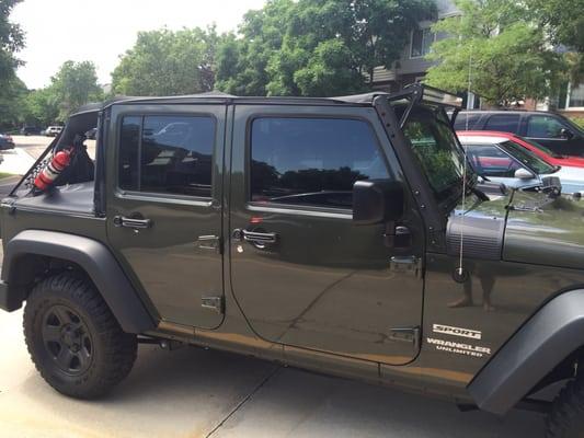 2015 Jeep Wrangler Unlimited with 20% front and back.