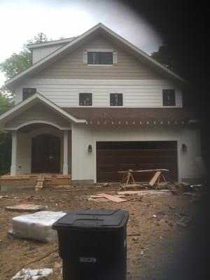 Found a perfect colored garage door to match our front door.