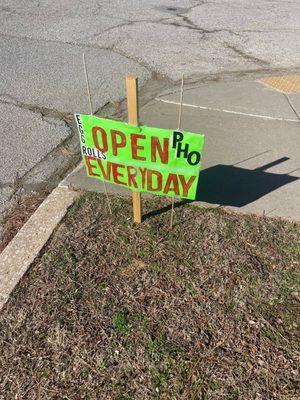 Neon green sign on the corner