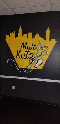 Art work of our logo on the wall