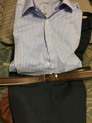 Dark blue dress pants with brown belt along with a white and blue dress shirt. Thanks Vernon for helping me out. YouTube video coming soon!