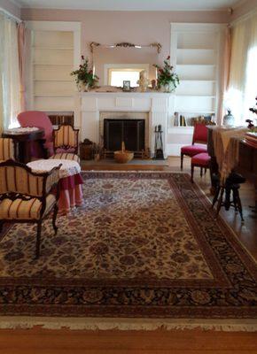 The Living Room - With the walls recently painted, the docents are still busy reorganizing shelves and wall decorations.