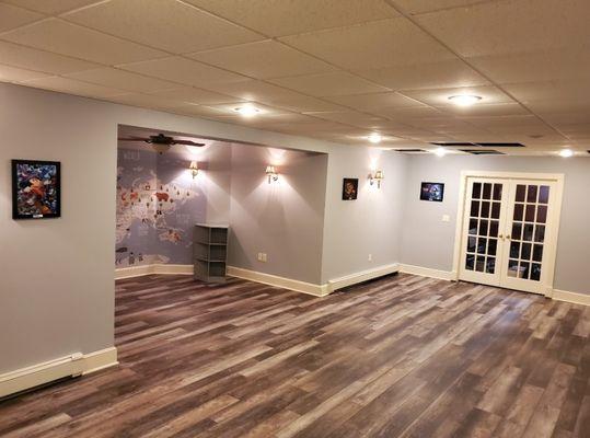 Remodeled basement.. Here is  painting and flooring  and doors..