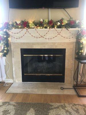 Remodeled around fireplace and hearth to bring up to codes .