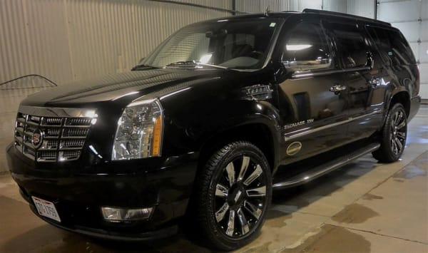 Our Cadillac Escalade ESV suv. (Black, seats up to 5)