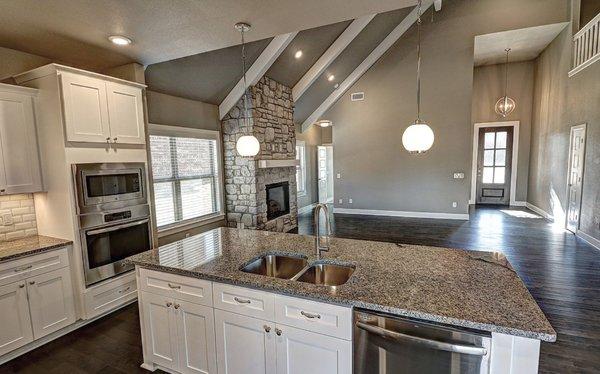 Granite counter tops with stainless appliances - view more at Diamond Estates and Maple Estates in Centerton.